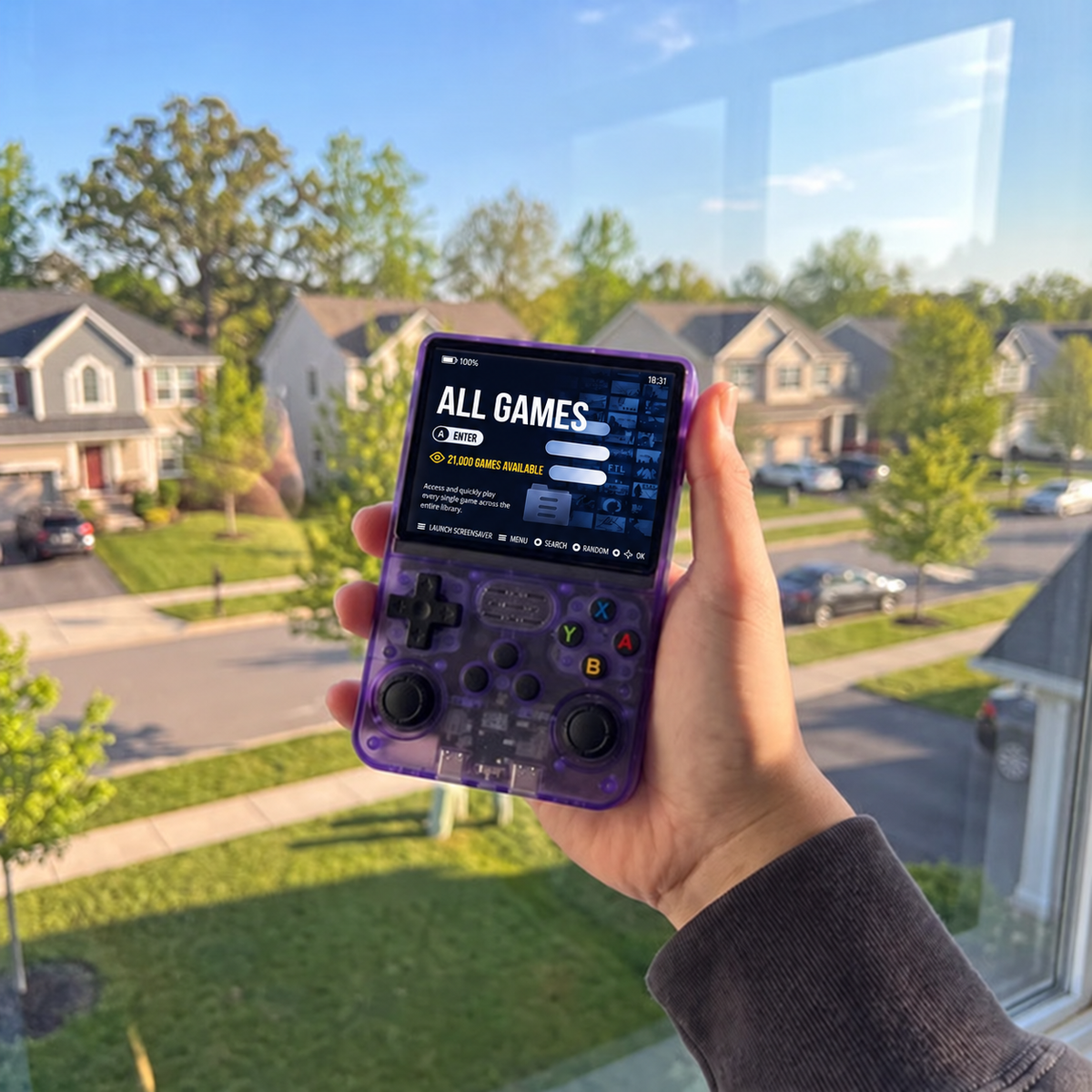 Hand holding a purple retro handheld console near a window