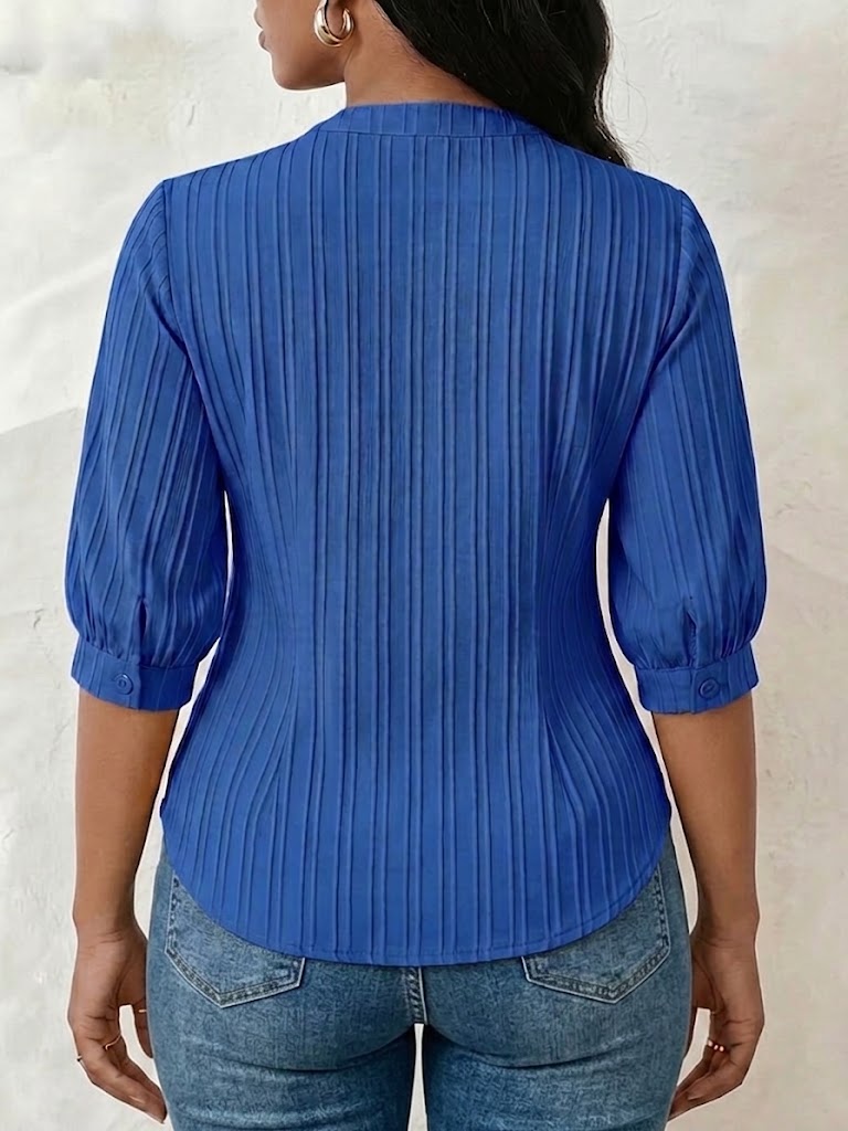 Lace-paneled V-neck Blouse Featuring Vertical Pleats, A Fitted Waist, And Puff Three-quarter Sleeves